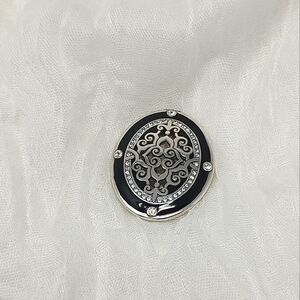 Gold, black, silver two-sided medallion scroll & crystal design
